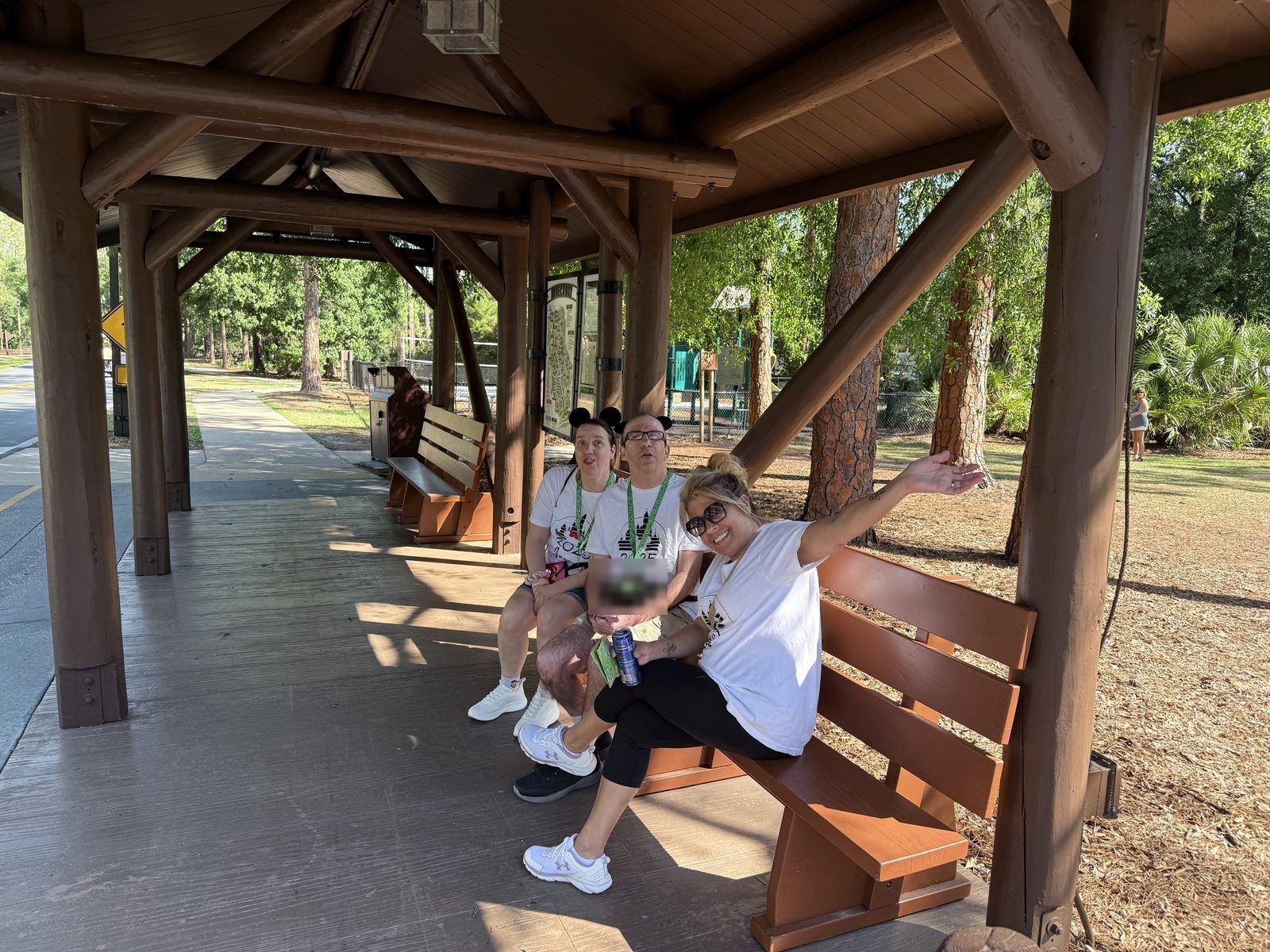 Waiting at a Fort Wilderness bus stop pavilion