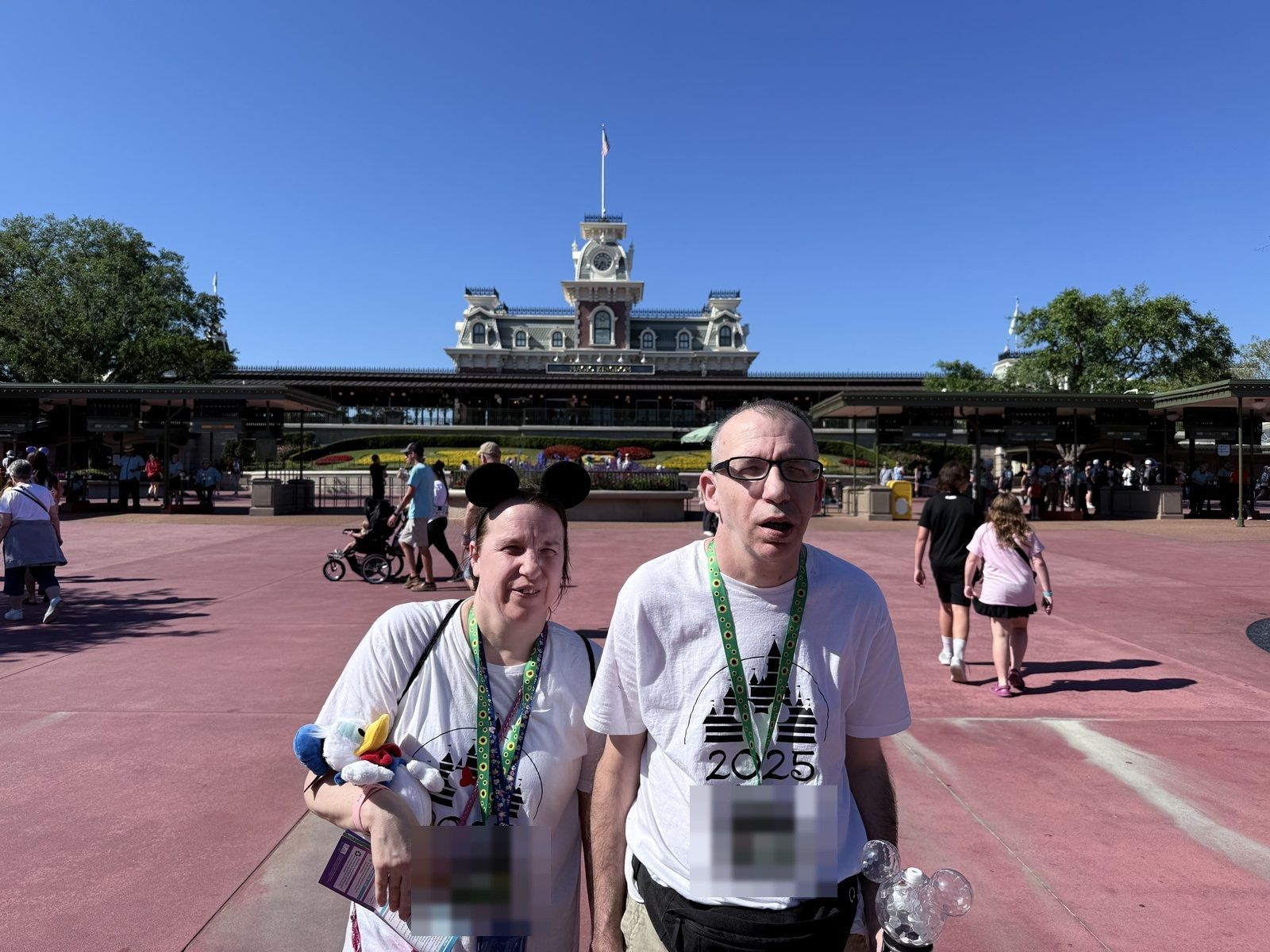 J&J in front of the Magic Kingdom entrance train station
